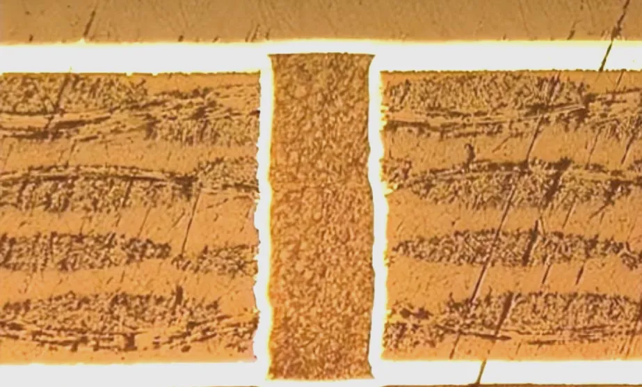 Cross-section of a PCB showing filled vias for better performance