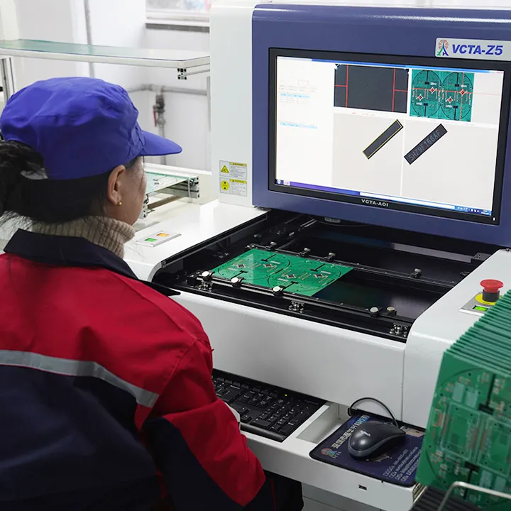 Technician calibrating AOI system to reduce false calls in PCB inspection