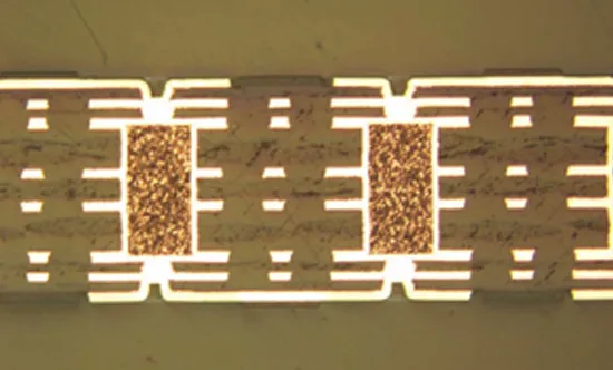 Cross-section of HDI PCB showing microvias and layer bonding