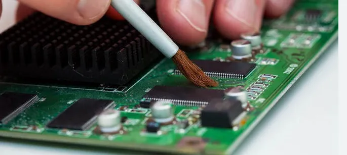 Close-up of a PCB with conformal coating for environmental protection