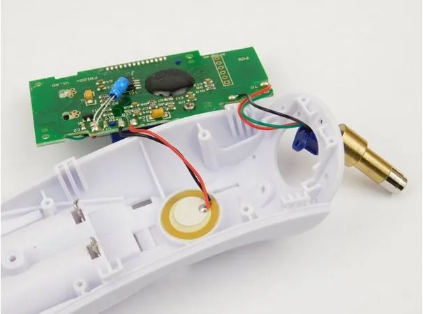 Single-sided PCB inside a consumer electronic device like a remote control.