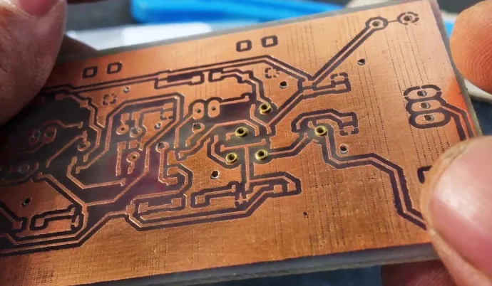 Double-sided PCB with vias and dual-side components