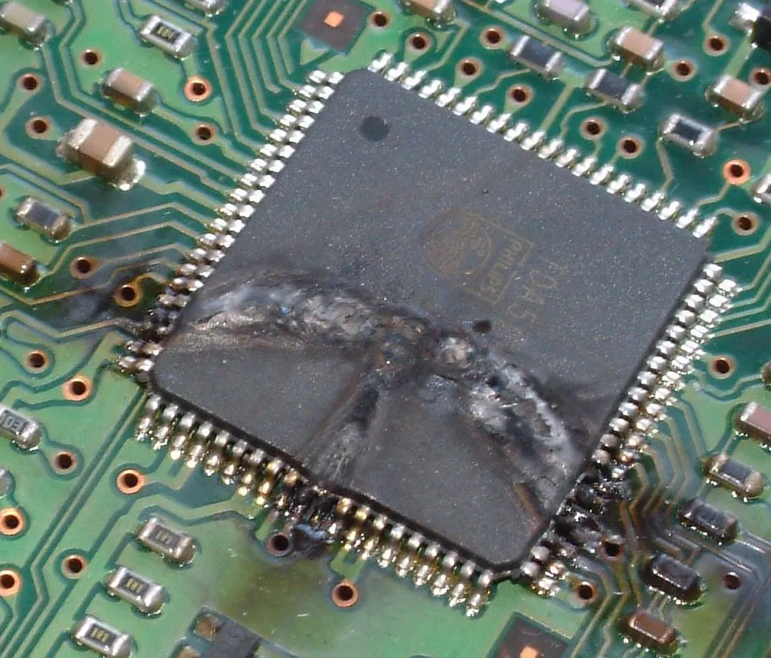Microscopic view of latent ESD damage on PCB component