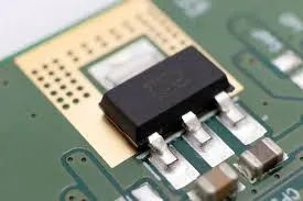 Close-up of PCB with SMD active components like transistors and ICs.