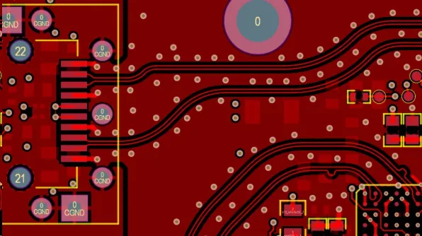 PCB layout showing thermal vias connecting copper planes beneath a high-power component