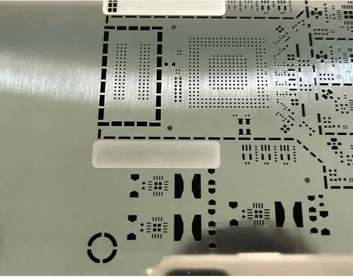 Segmented stepped stencil cross-section view: thin area serving fine-pitch components, thick area serving high-power pads.