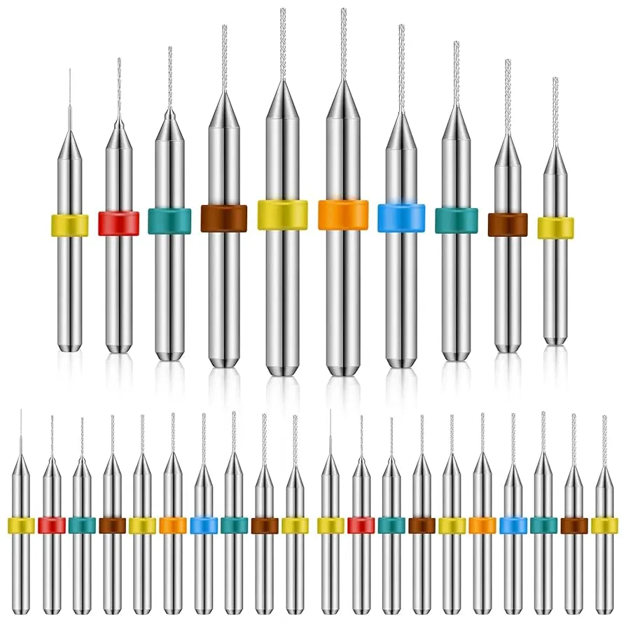 Assortment of PCB drill bits for different hole sizes and laminate materials.