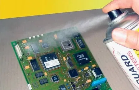 Application of conformal coating on military radar PCB using spray method.