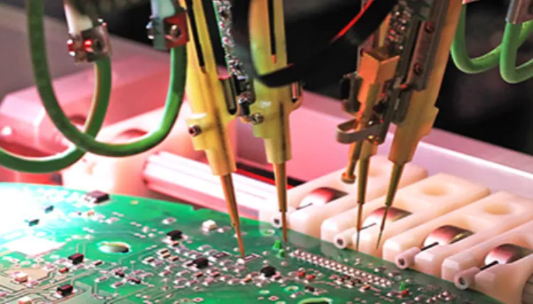 AOI machine and ICT test fixture setup for PCB quality control.