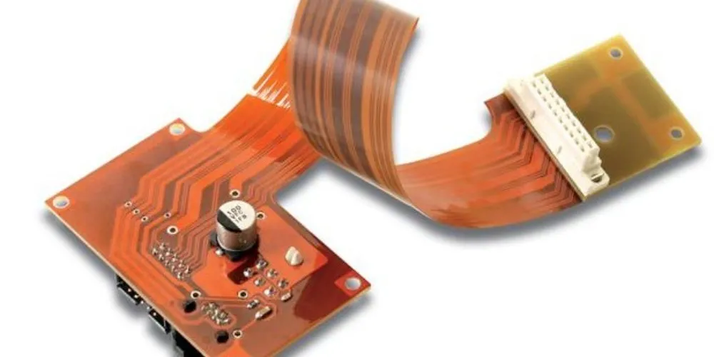Flexible polyimide PCB in wearable technology for durability.