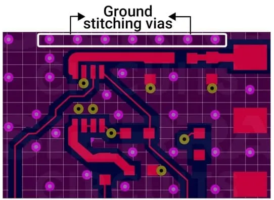PCB layout with ground plane and through-hole stitching vias for grounding.