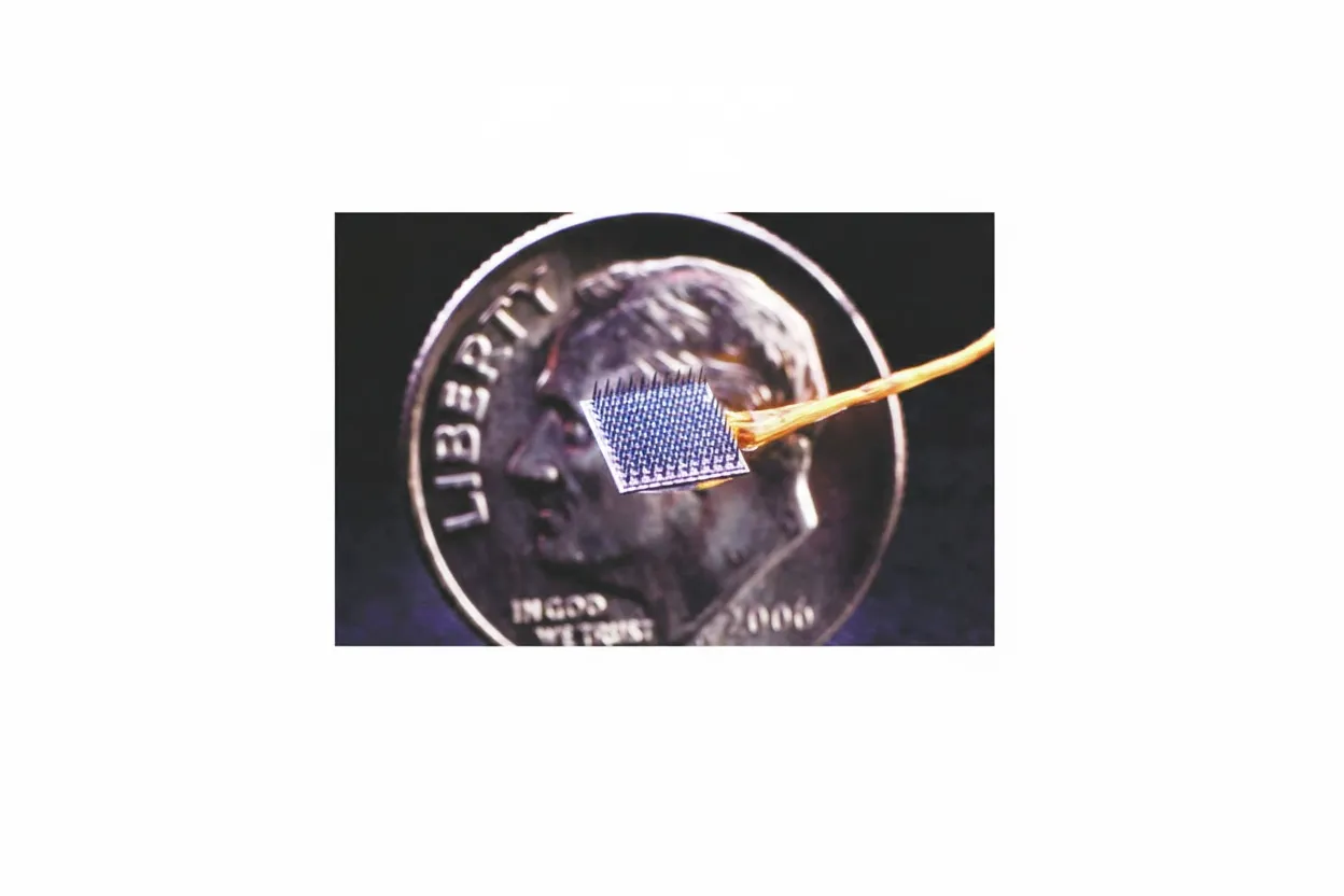 BrainGate implant consisting of 100 small metal electrodes (about the size of a dime) recording motor cortex signals during handwriting, then converted in real time to text. Source: BrainGate (public domain).