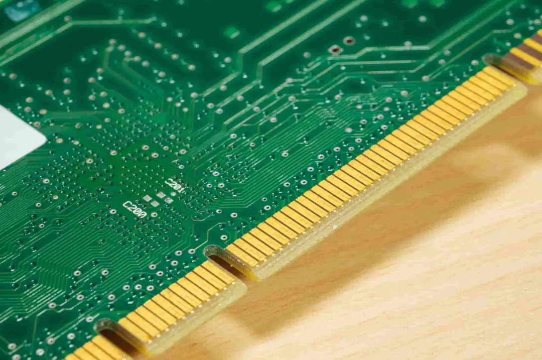 Close-up of PCB gold fingers with gold plating on circuit board edge