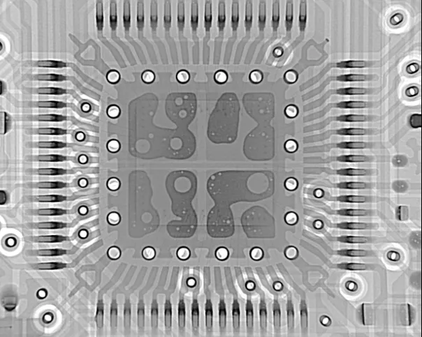 Close-up X-ray highlighting voids, bridges, and misalignments in BGA joints