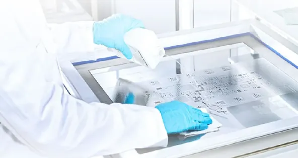 Cleaning PCB stencil with lint-free cloth for maintenance