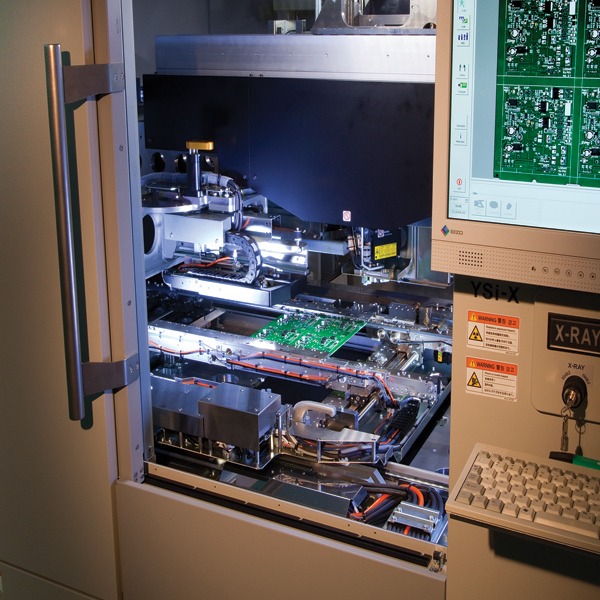 Suggested Image Placement: Insert an image of an engineer operating an X-Ray inspection machine with a BGA board. ALT Text: "Engineer using X-Ray machine for BGA inspection."