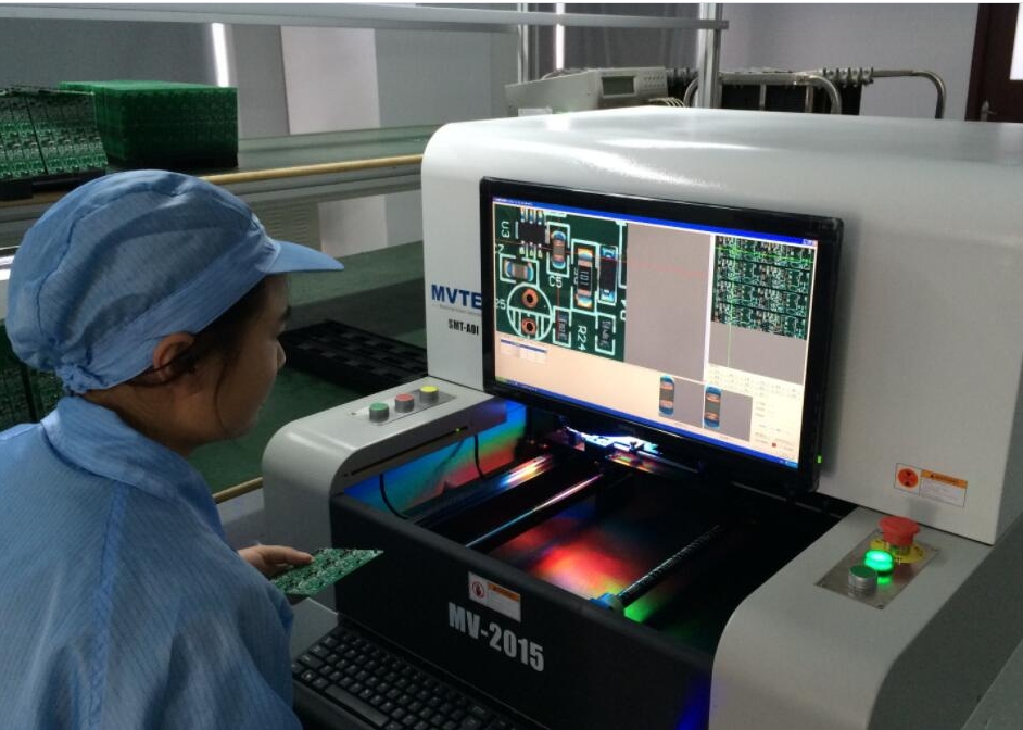 AOI system inspecting PCB in SMT manufacturing.