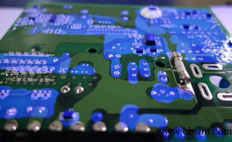 Selective conformal coating