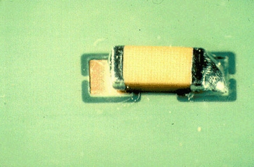 Insufficient solder defect causing weak PCB joint.