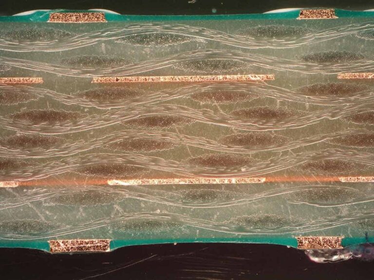 Microscopic view of FR-4 PCB material layers