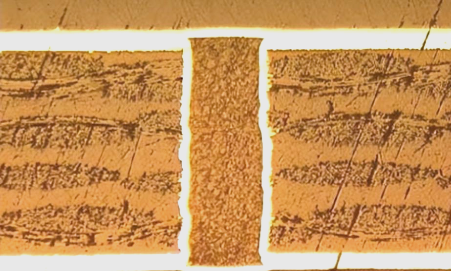 Cross-section of a PCB showing filled vias for better performance