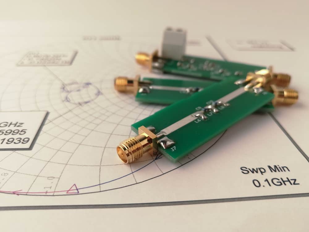 RF circuit board with highlighted impedance matching components.
