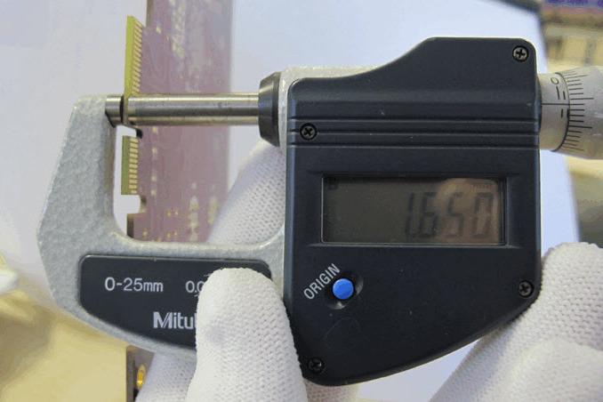 Measuring FR-4 PCB thickness tolerance with a caliper