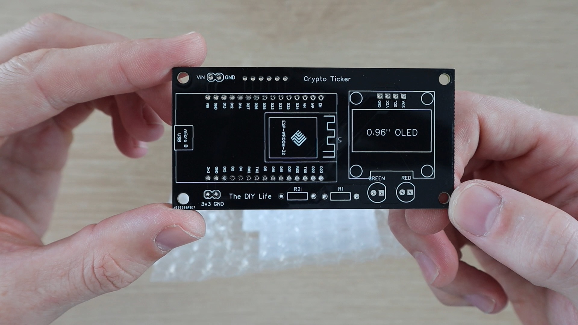 PCBs showcasing black and white silkscreen for aesthetic branding