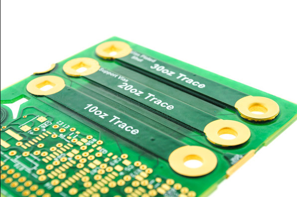 Comparison of standard PCB vs heavy copper PCB showing copper thickness."
