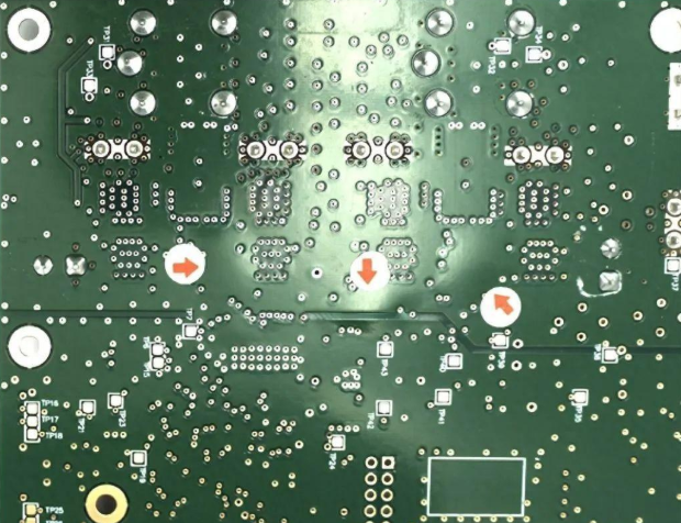 PCB with dry film solder mask adhesion issues vs. properly adhered mask