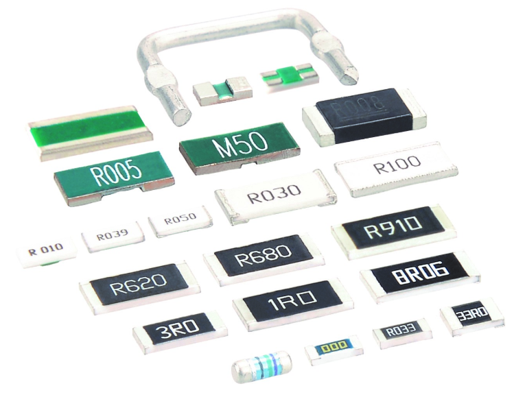 Close-up of SMD resistor on a printed circuit board for code identification.