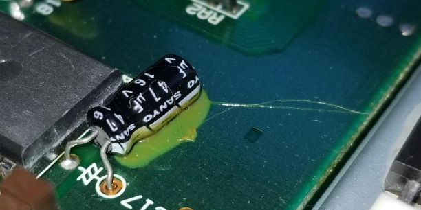 Damaged PCB connector due to mechanical stress or misalignment.