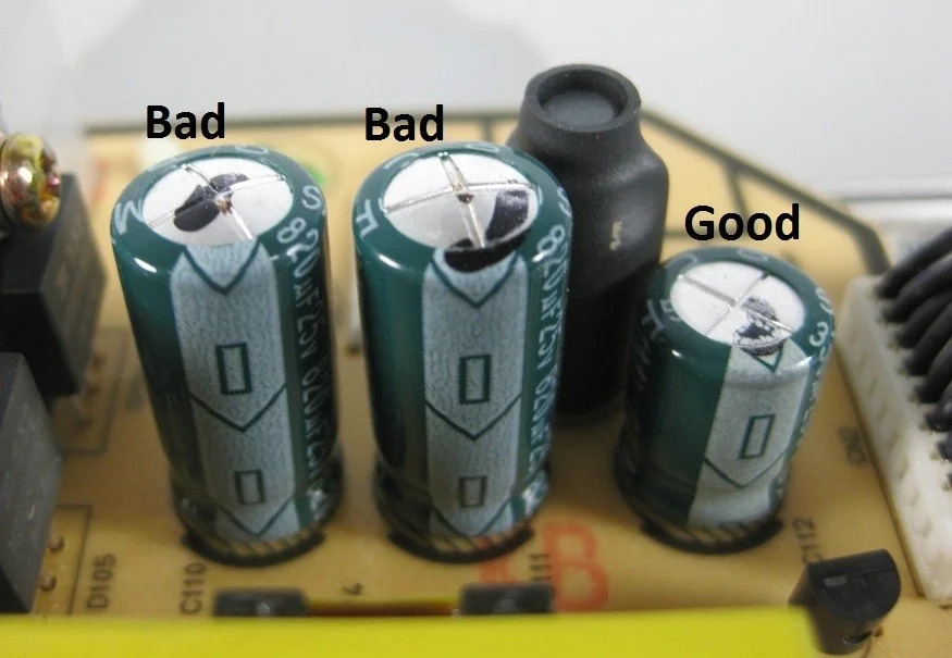 Bulging electrolytic capacitor indicating failure on PCB
