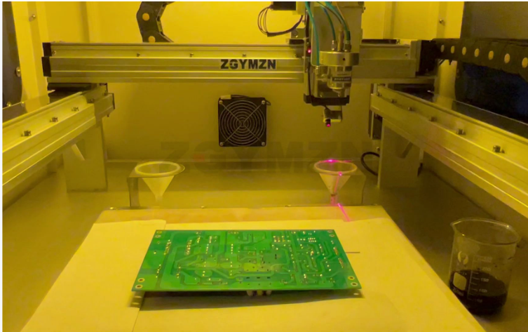 PCB during solder mask application process with UV exposure.