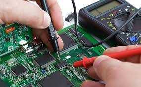 Testing an assembled FR-4 PCB with a multimeter for continuity and shorts