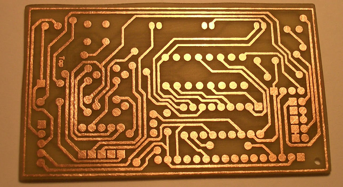PCB during fabrication with etched copper traces