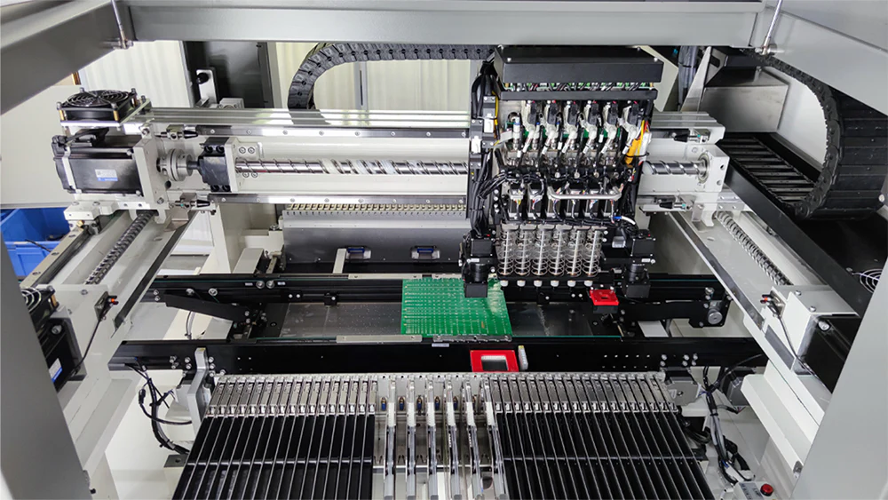 Pick-and-place machine placing SMT components on PCB