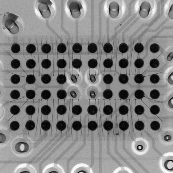 X-ray image of BGA solder voids vs. AOI surface defect detection.
