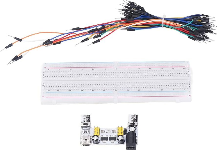 Essential materials for breadboard PCB prototyping including jumper wires and components.