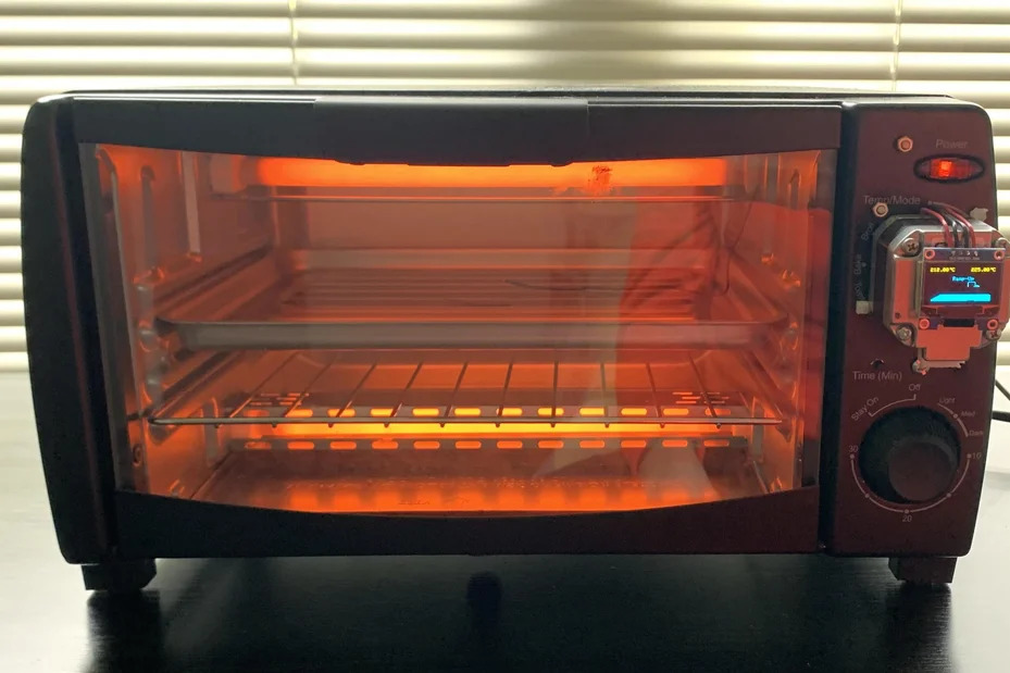Thermocouple setup inside toaster oven for temperature monitoring