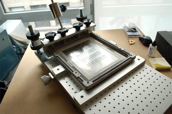 Essential tools for DIY stencil printing in electronics assembly.