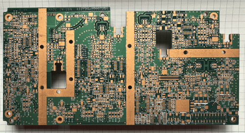 rregular PCB shape with thermal vias and trace routing layout.