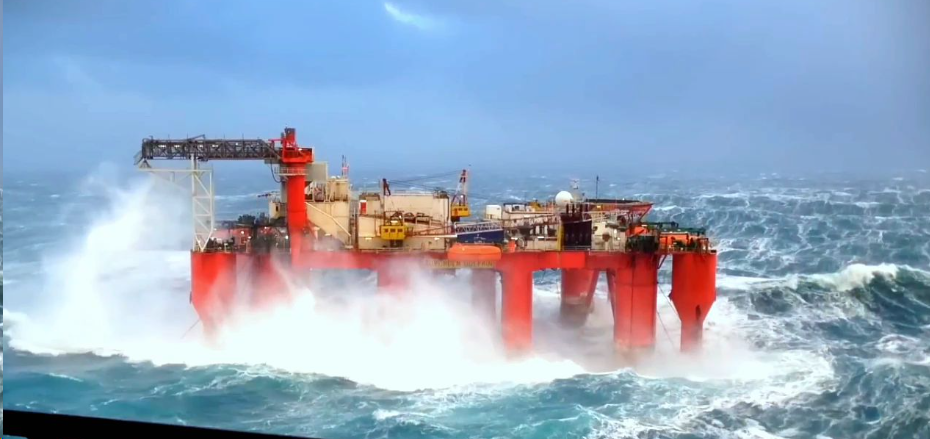 Offshore oil rig in harsh weather conditions for PCB case study.