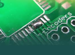 "Solder bridging defect on audio amplifier PCB during SMT assembly"