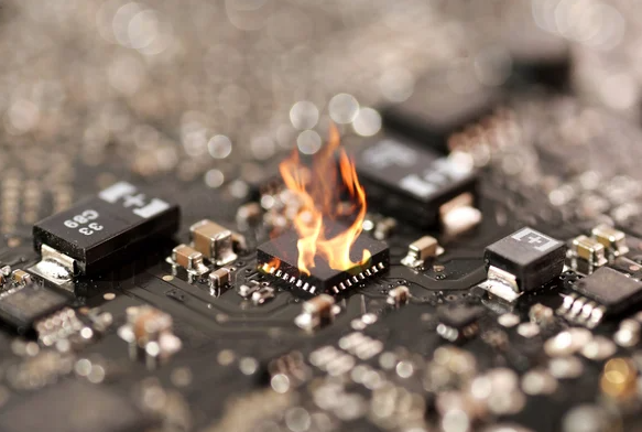 Damaged MRI PCB showing burnt component during troubleshooting."
