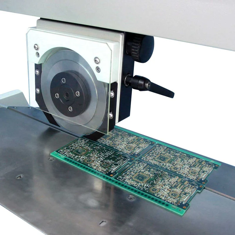 Automated PCB depaneling machine cutting a panel with precision.