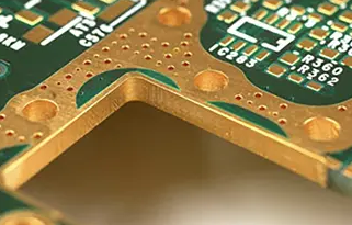 Close-up of a PCB with ENIG surface finish showing gold coating