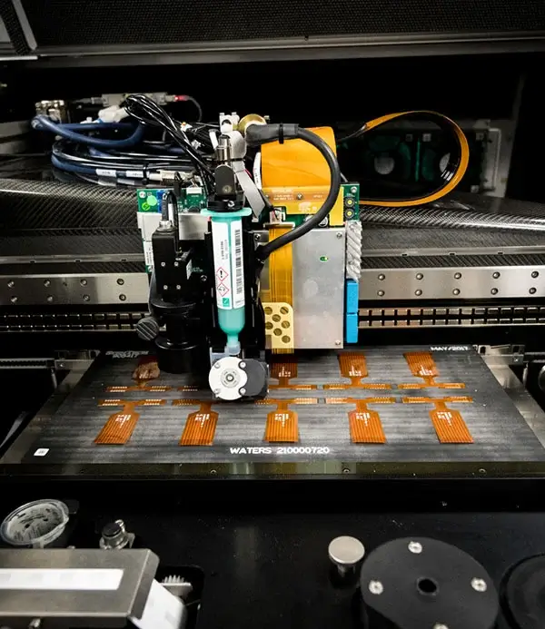 Rigid-flex PCB manufacturing process showing lamination equipment for production