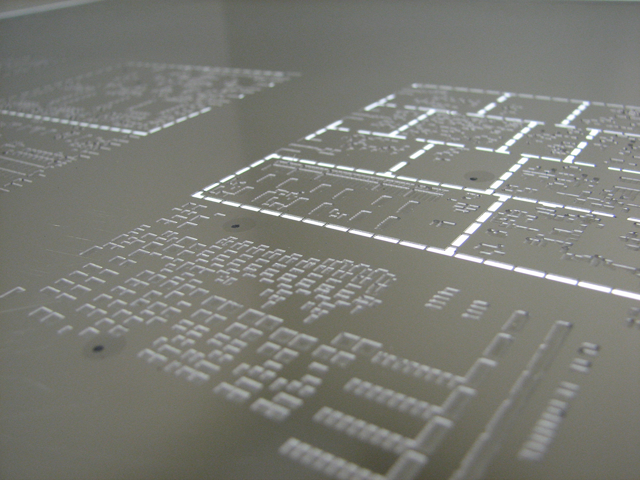 Close-up of solder paste stencil apertures for PCB assembly
