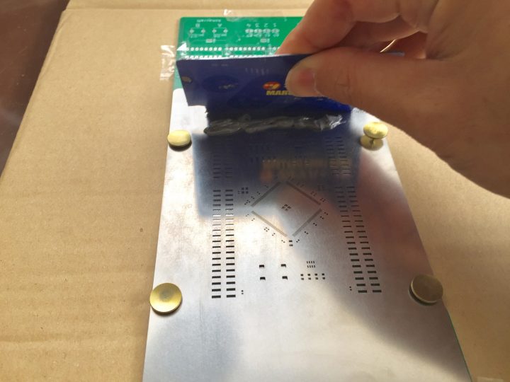 Stencil aligned on PCB for BTC solder paste printing